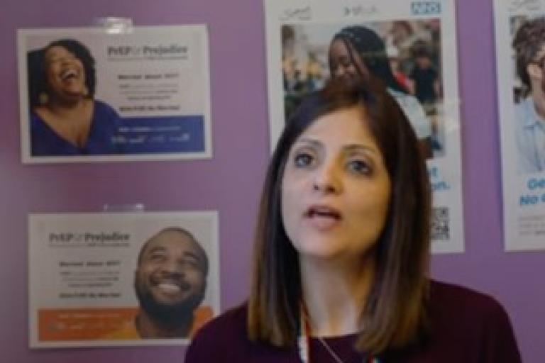 GP from a HIV clinic talking to camera